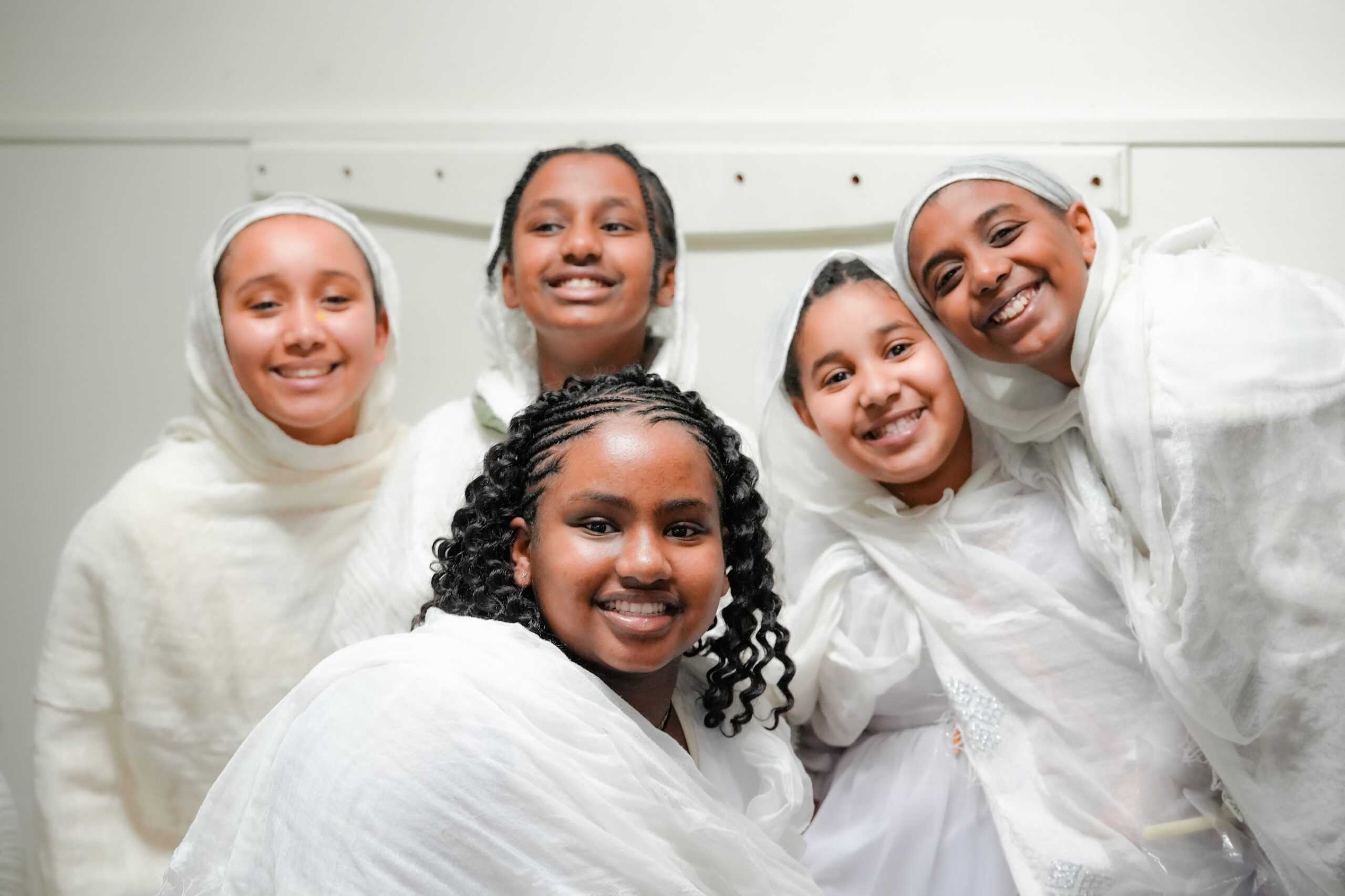 Sunday school congregation and youth engaged in learning and praise