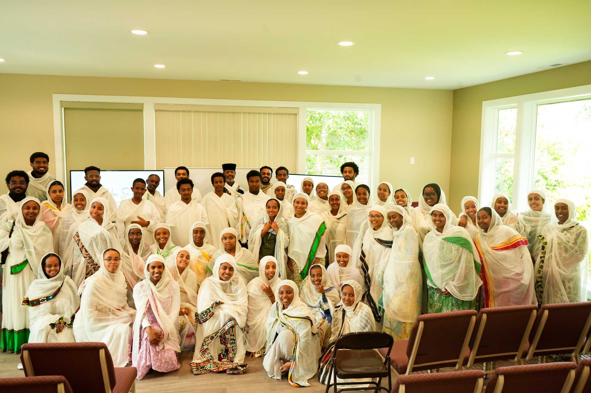 Fenote Selam Sunday School choir and congregation gathering in worship